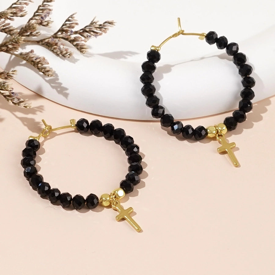 Серьги из искусственного капля с черными из бисера.