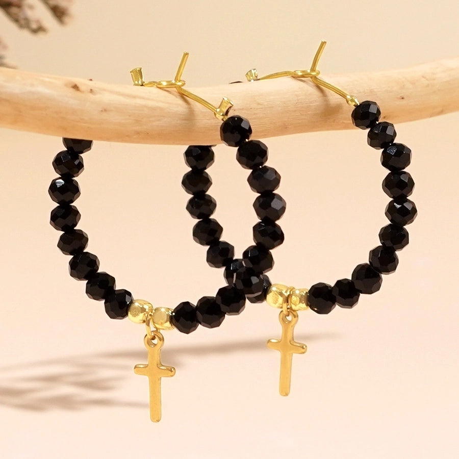 Серьги из искусственного капля с черными из бисера.