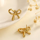 Acero inoxidable Nuevo graciosos y de moda Pearl Zircon Bow Flower Pendientes de tachuelas de altura