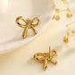 Acero inoxidable Nuevo graciosos y de moda Pearl Zircon Bow Flower Pendientes de tachuelas de altura