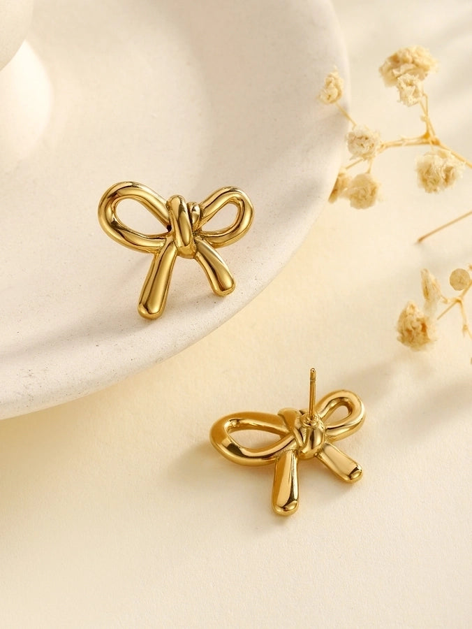 Acero inoxidable Nuevo graciosos y de moda Pearl Zircon Bow Flower Pendientes de tachuelas de altura